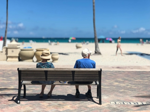 Two seniors on a beach 